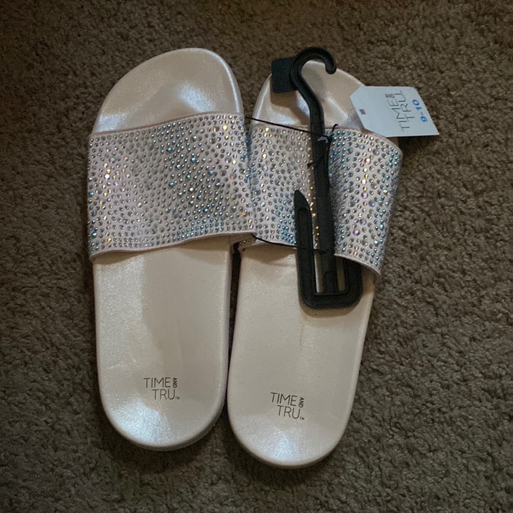 Light pink bedazzled slides